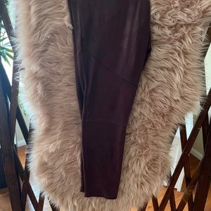 These purple and black tight fit pants are cute for the evening